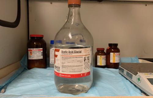 Acetic acid in a fume hood
